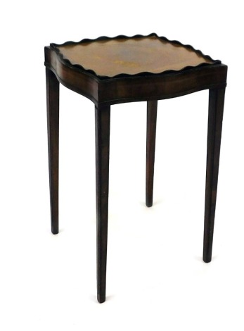 A small mahogany urn table, with a galleried top on square tapering legs, 49cm high, the top 30cm x 30cm.