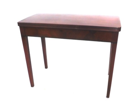 A late 19thC mahogany card table, of plain form, on taper legs, 74cm high, 90cm wide, 44cm deep.