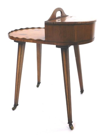 A yew butler's serving table, the top with a raised gallery for plates, side by side with a lidded compartment for cutlery, on square tapering legs and brass castors, 63cm high, 52cm wide, 33cm deep.