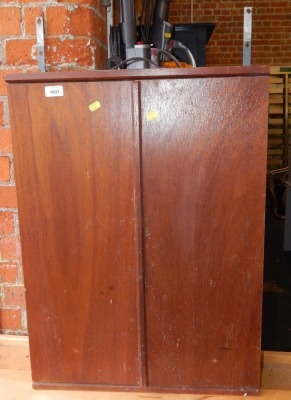 A pine tool cabinet, with two cupboard doors opening to reveal a fitted hanging tool interior, with a small selection of tools, including mainly screw drivers. - 2