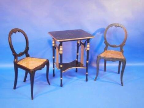 A suite of Victorian ebonised furniture comprising side table with undershelf