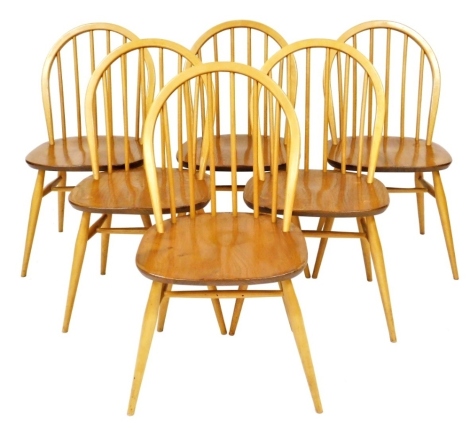 A set of six Ercol Windsor light elm and beech dining chairs, with H stretcher, raised on cylindrical tapering supports, 80cm high.