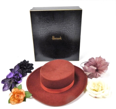 A Christian Dior Diorling lady's wool hat, Alexon fascinator, and silk floral corsage, in a Harrods box.