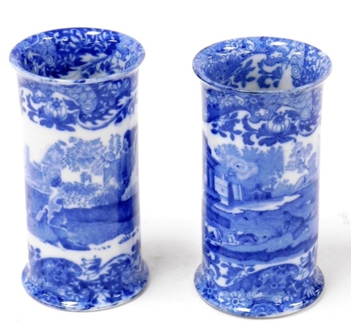 A pair of Copeland Spode's Italian blue and white spill vases, of cylindrical form, oval blue printed mark, 10cm high.