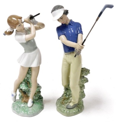 A pair of Nao porcelain figures of golfers, man and woman, 451 and 450.