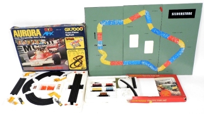 A Hornby electric train set, incomplete, an Aurora The Fast Ones electric GX7000 motor racing game, and a model of Silverstone motor racing circuit, possibly incomplete.