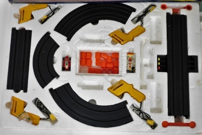 A Hornby electric train set, incomplete, an Aurora The Fast Ones electric GX7000 motor racing game, and a model of Silverstone motor racing circuit, possibly incomplete. - 2