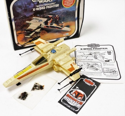 A group of Star Wars boxed toys; Battle Damaged X-Wing Fighter, Rebel Armor Snowspeeder and Darth Vader The Fighter. (3) - 2