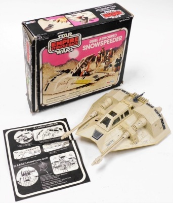 A group of Star Wars boxed toys; Battle Damaged X-Wing Fighter, Rebel Armor Snowspeeder and Darth Vader The Fighter. (3) - 3