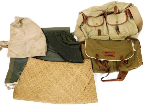 A Brady canvas fishing bag, a further canvas and leather fishing bag, a green fishing hat, etc. (1 box)