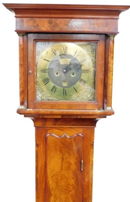 A Georgian flame mahogany long case clock by Thomas Simpson of Durham, square brass dial with spandrels cast with urns of flowers, birds and animals, chapter ring bearing Roman and Arabic numerals, date aperture, eight day movement with bell strike, the h