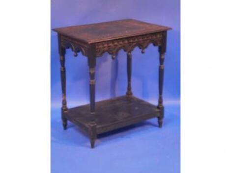 A Victorian dark oak occasional table