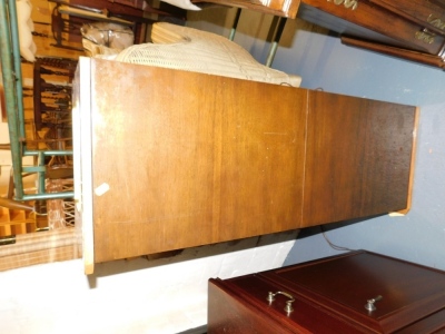 A mid 20thC Phillips stereo teak cased radiogram, lacking legs, 110cm wide. Buyer Note: WARNING! This lot contains untested or unsafe electrical items. It is supplied for scrap or reconditioning only. TRADE ONLY