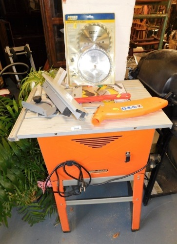 A New Generation circular saw bench, with some blades.