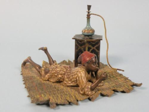 A coal painted bronze inkwell by Franz Bergman