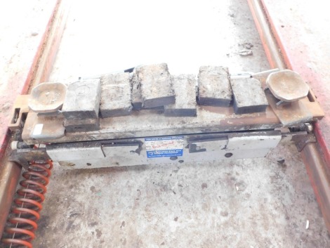 A pneumatic ramp jack and blocks.