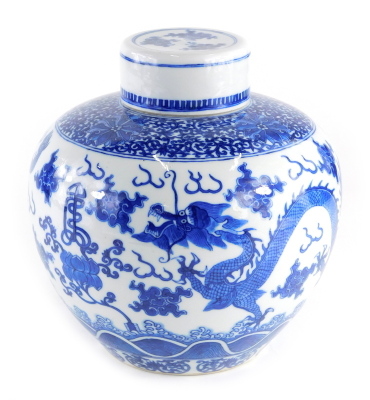 A 19thC Chinese porcelain ginger jar and cover, decorated in underglaze blue with a band of scrolls, peonies above clouds, flowers and four toed dragons, four character Yongzheng mark, 22.5cm high, 22.5cm wide.