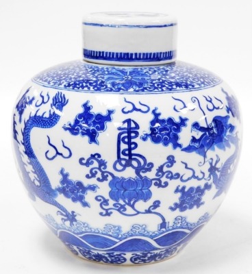 A 19thC Chinese porcelain ginger jar and cover, decorated in underglaze blue with a band of scrolls, peonies above clouds, flowers and four toed dragons, four character Yongzheng mark, 22.5cm high, 22.5cm wide. - 3