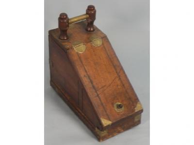 A 19thC walnut coal scuttle of tapering form