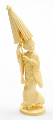 An early 20thC Japanese ivory okimono, of a geisha holding parasol, signed to base, 21cm high. - 7