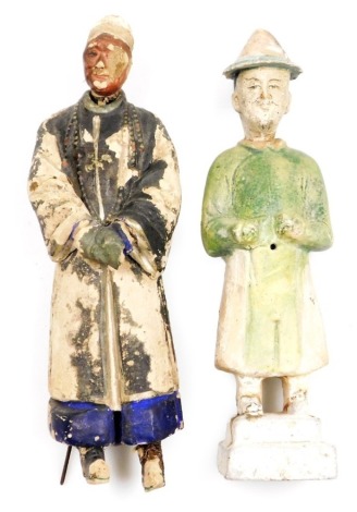 Two Chinese pottery figures, one in Tang style green glaze, with domed hat, the other of a mandarin with necklace (glaze deteriorated), 27cm high. (AF)