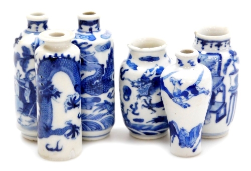 Three Chinese blue and white cylindrical porcelain snuff bottles, decorated with dragons, figures in a landscape, another of meiping form decorated with horses, and two further miniature blue and white vases; various Yongzheng and Qianlong marks to the un