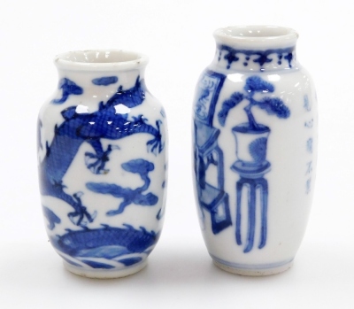 Three Chinese blue and white cylindrical porcelain snuff bottles, decorated with dragons, figures in a landscape, another of meiping form decorated with horses, and two further miniature blue and white vases; various Yongzheng and Qianlong marks to the un - 3