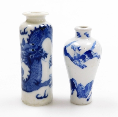 Three Chinese blue and white cylindrical porcelain snuff bottles, decorated with dragons, figures in a landscape, another of meiping form decorated with horses, and two further miniature blue and white vases; various Yongzheng and Qianlong marks to the un - 15