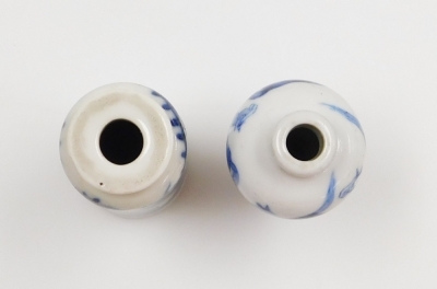 Three Chinese blue and white cylindrical porcelain snuff bottles, decorated with dragons, figures in a landscape, another of meiping form decorated with horses, and two further miniature blue and white vases; various Yongzheng and Qianlong marks to the un - 19