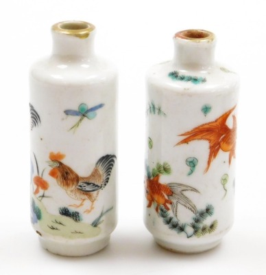 Two Chinese porcelain snuff bottles, decorated with Shubunkin and cockerels, 7.7cm and 8cm high, a small Chinese doucai bowl decorated with grasshoppers and flowers, 8cm high, a glass scent bottle and a small blue and white vase. (5) - 4