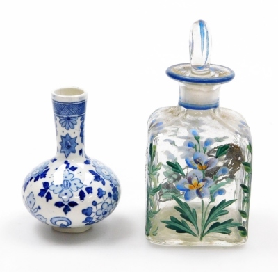 Two Chinese porcelain snuff bottles, decorated with Shubunkin and cockerels, 7.7cm and 8cm high, a small Chinese doucai bowl decorated with grasshoppers and flowers, 8cm high, a glass scent bottle and a small blue and white vase. (5) - 16