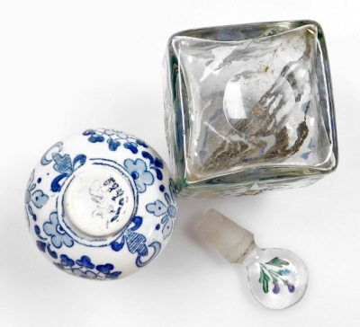 Two Chinese porcelain snuff bottles, decorated with Shubunkin and cockerels, 7.7cm and 8cm high, a small Chinese doucai bowl decorated with grasshoppers and flowers, 8cm high, a glass scent bottle and a small blue and white vase. (5) - 18