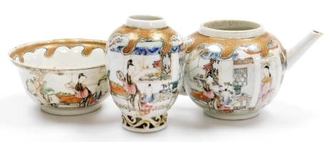 An 18thC Chinese teapot with matching bowl and teapoy, hand painted with figures on a terrace and with gold hatched wave like borders, teapot lacking lid, vase 10cm high, bowl 12cm diameter, teapot 8.5cm high. (3)