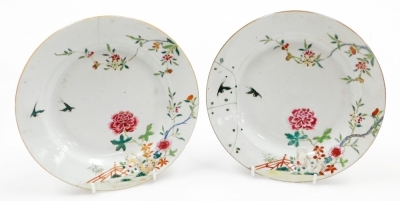 A collection of 18th Chinese plates, including four matching famille rose with chrysanthemum and swallow decoration, 23cm diameter, a pair with flowers and vases, 23cm diameter, and a Chinese Imari plate, 22.8cm diameter. (AF) - 8