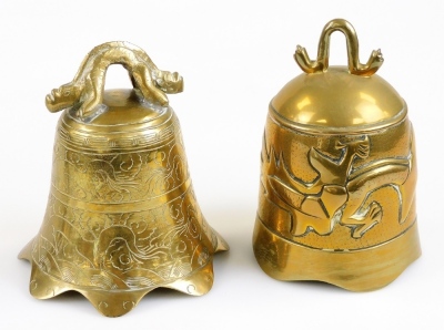 A Chinese brass bell, in a carved hardwood stand, 45cm high, and further bell. (2) - 2