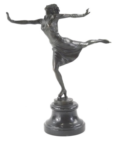 After Antonio Cesaro. An Art Deco style bronze figure of a lady ice skating, on an inverted circular base, bearing signature, 39cm high.