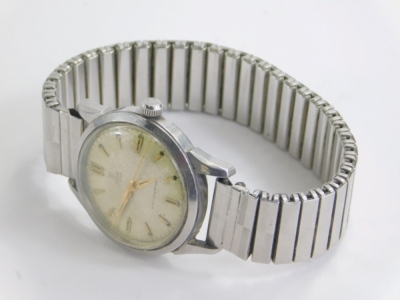 A Rolex Tudor gentleman's automatic wristwatch, with baton pointers and numerals, marked TUDOR OYSTER to the 3cm dia. face, in a stainless steel case with elasticated bracelet. - 2