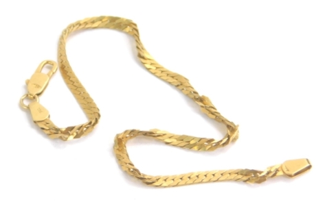 A fancy link bracelet, with S links, marked 750 to the clasp, 18cm long, 3g.