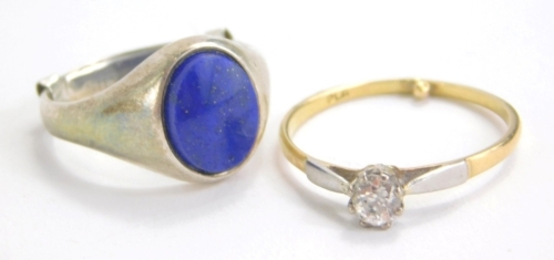 A solitaire ring, set with white stone, marked plat, size L and a further dress ring set with polished blue stone. (2)