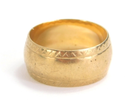 A 9ct gold wedding band, size M, 5.7g.