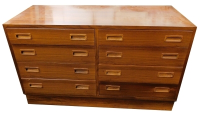 A Danish rosewood chest of drawers, of plain form with eight drawers, each with recessed handles on a plinth, 68cm high, 107cm wide, 44cm deep. CITES license no. 612358/02