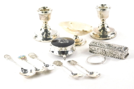 Various silver, a Victorian tortoise shell topped dressing table jar of circular form on shaped feet, Birmingham 1897, 7cm dia., two dwarf candlesticks, mother of pearl shell topped dish, souvenir spoons and silver tooth pick box, approx 5oz. (a quantity)