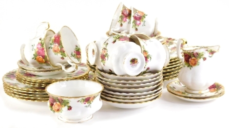 A Royal Albert Old Country Roses part dinner and tea service, to include dinner plates, 24cm dia., cups, saucers, milk jug, sugar bowl, etc., printed marks beneath. (a quantity)