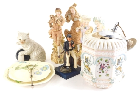 Various pottery and effects, a 20thC continental bisque figure of children playing musical instrument and holding fan, 28cm high, sailor figure, cake stand, Royal Winton two tier raised floral cake stand, other bisque figures, glass lamp shade, Staffordsh