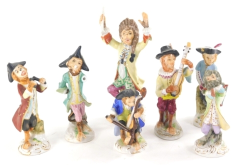 A 20thC Sitzendorf porcelain part monkey band, to include conductor, 16cm high, various other musicians, decorated in colours, blue crown and S mark beneath. (a quantity, AF)