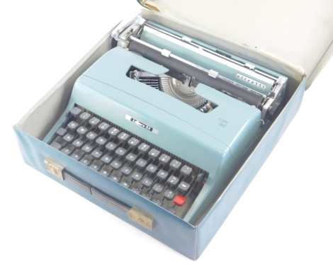 A vintage Olivetti Lettera 32 typewriter, blue trim 25cm wide and fitted case.