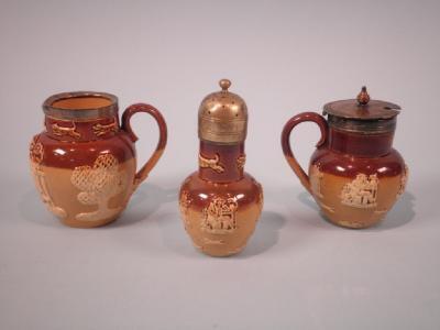 A Doulton Lambeth stoneware mustard pot with plated rim