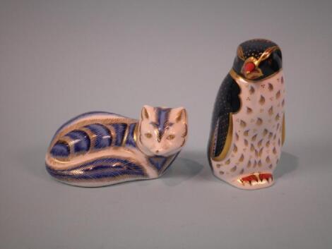 A Royal Crown Derby figure of a Weasel and a Rock Hopper Penguin