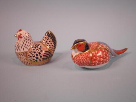 A Royal Crown Derby porcelain pheasant and a hen