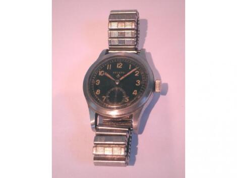 A military issue Record gentleman's wrist watch in a steel case with black dial